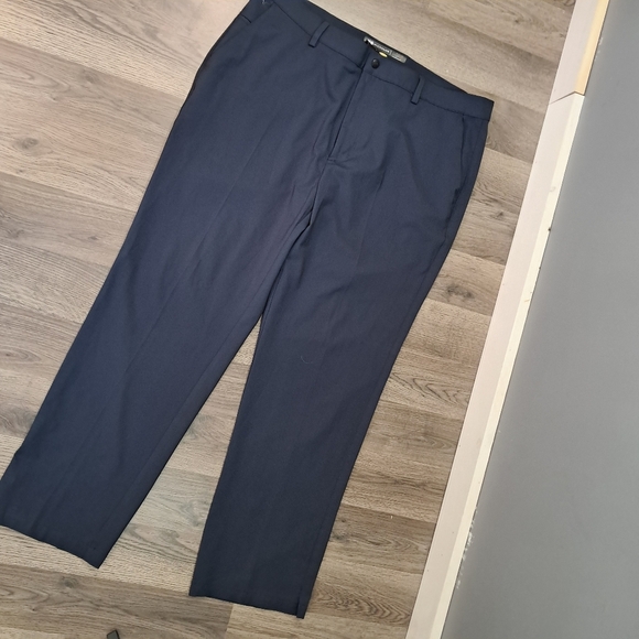 The Greg Norman Men's 38x30 Navy Golf Casual Chino Trousers are a versatile and - Picture 1 of 7